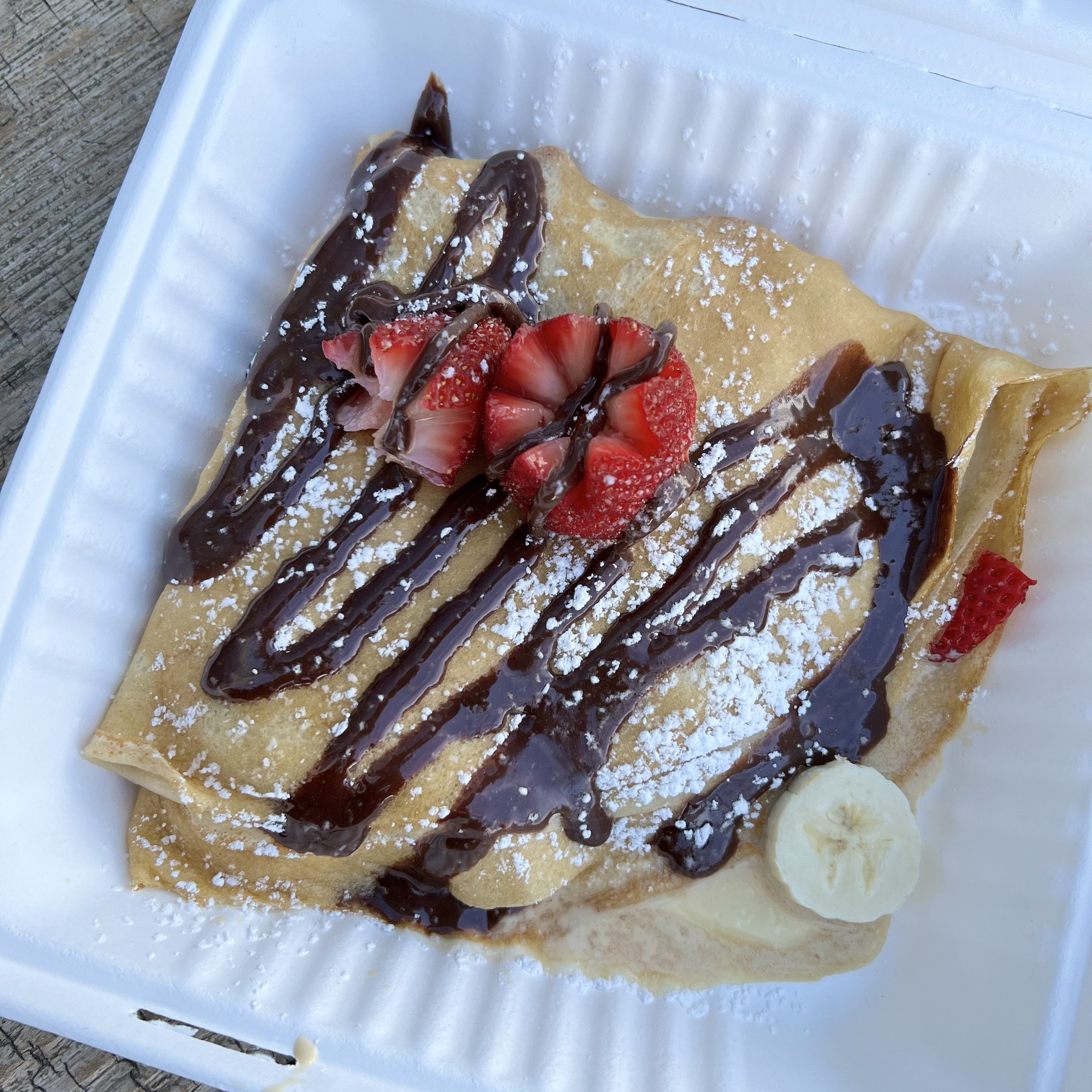 Crepe wth strawberries, banana, and nutella